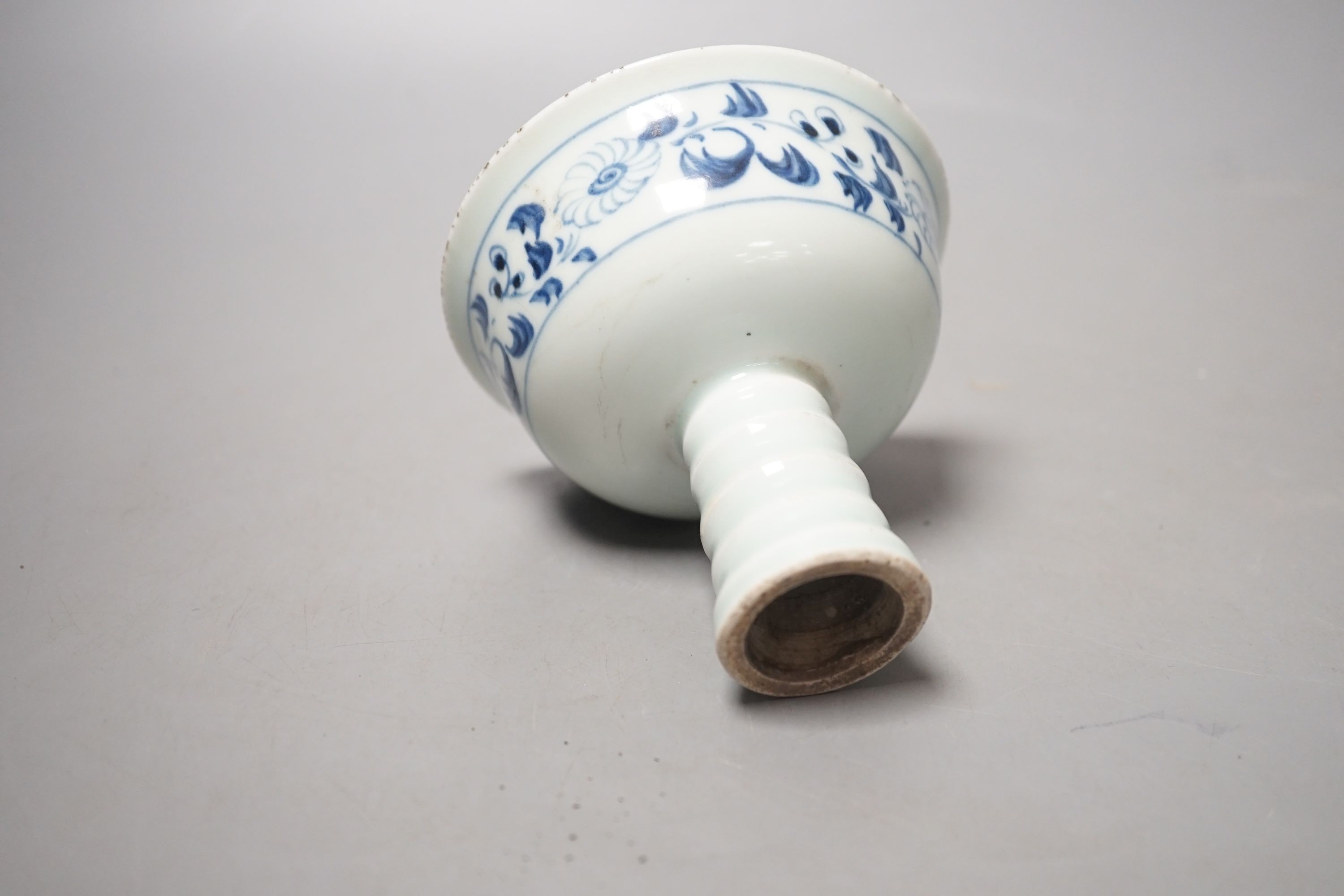 A Chinese blue and white stem cup, Ming Dynasty or later. Height 9cm